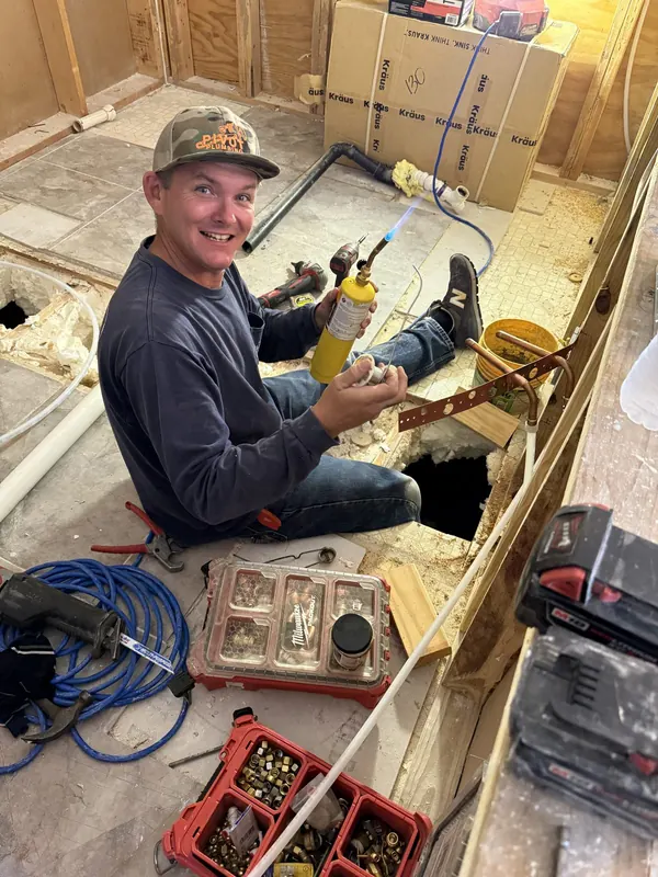 Chad Icke, master plumber, running a new-construction rough-in